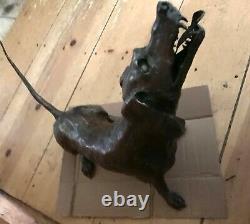 Bronze sculpted dachshund's statues. Guaranteed to catch attention-conversation
