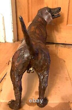 Bronze sculpted dachshund's statues. Guaranteed to catch attention-conversation